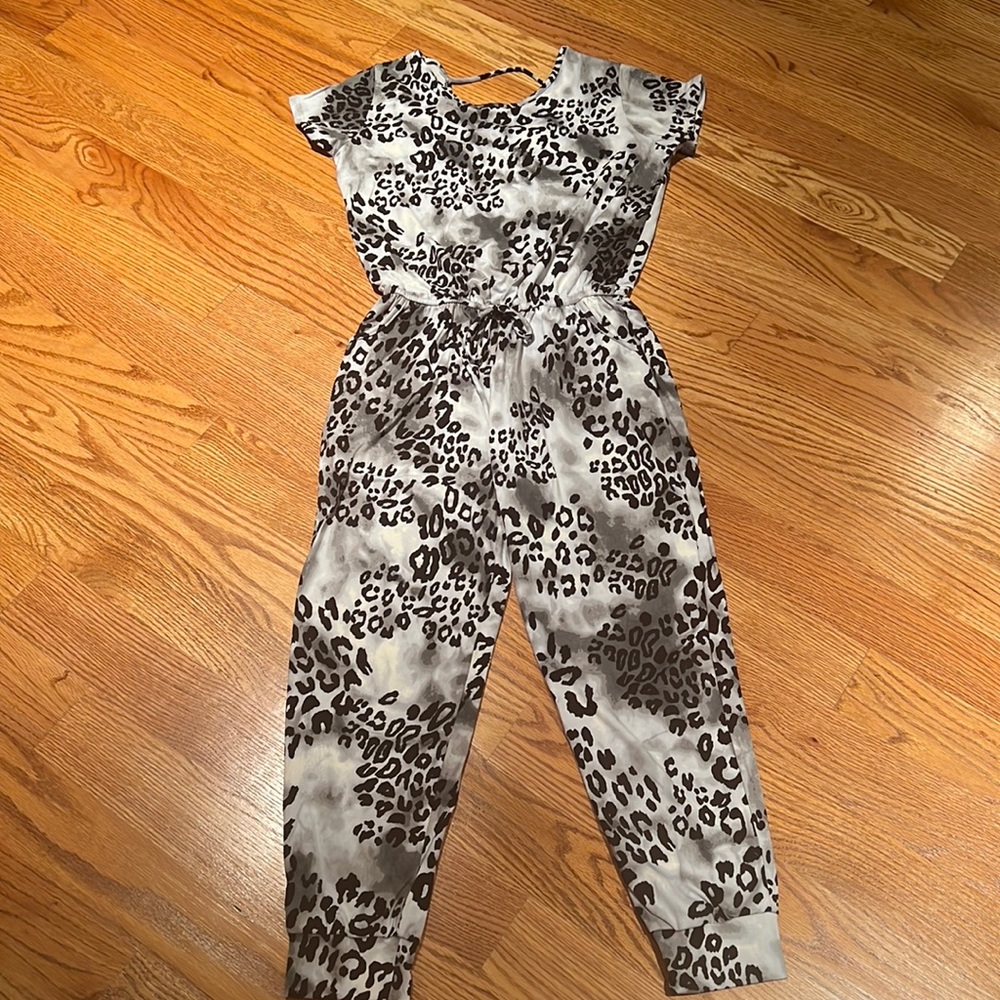 PixieLane short sleeve jumpsuit cheetah print size 14 like new be happy material